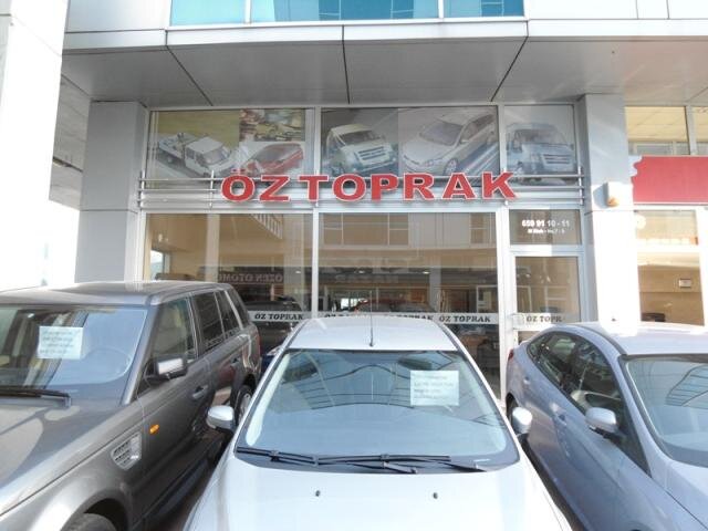 Öztoprak Otomotiv Siglă